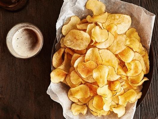 The photo на ястие - картофени чипсове с розмарин и зехтин